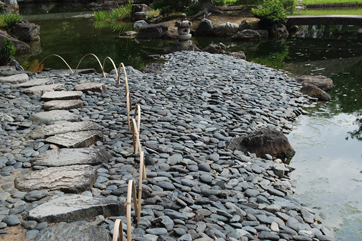 K. ENSHU, KYOTO: PEBBLES SLIDING TO WATER